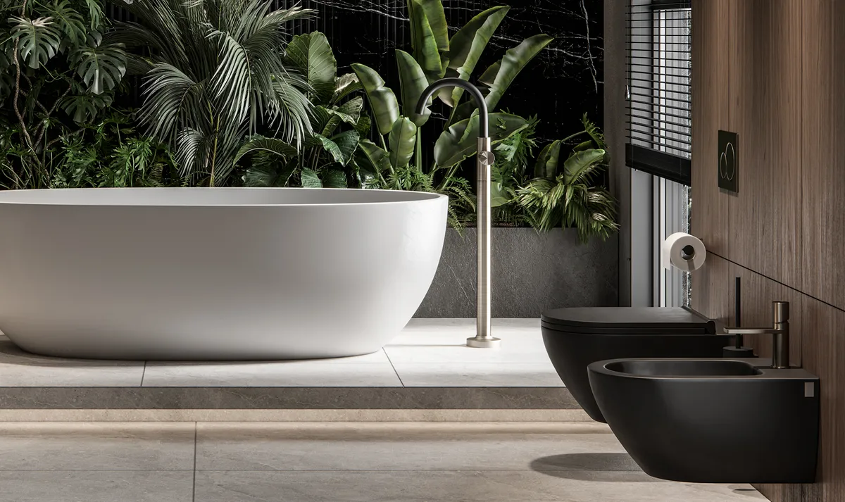 Luxury bathroom with a freestanding stone bath, matte black fixtures, timber panelling and tropical planting